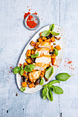 Chicken breast on a bed of sweet potatoes