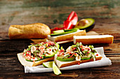 Sandwiches with lobster cocktail, avocado and lime