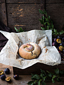 Big pastry snail stuffed with plum puree (vegan)