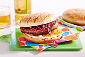 California burger with grilled pineapple, red vinegar onions and mustard cream