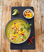 Fruity curry and coconut soup with mango, apple and lime