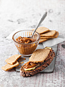 Gingerbread biscuits and gingerbread butter on black bread
