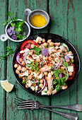 Chickpea salad with feta cheese and chicken