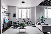 Modern living room in grey tones in the light loft