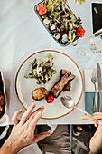 Grilled meat with salad