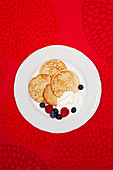 Pancakes with fruits on plate
