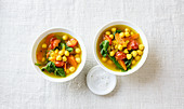 Moroccan chickpeas soup with tomatoes and spinach