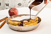 Yeast and apple omelette drizzled with chocolate sauce