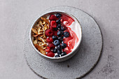 Vegan coconut smoothie bowl with berries