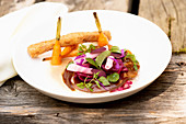 Pork neck and stock with beetroot