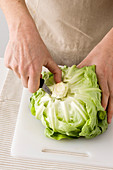 Removing the stalk from lettuce