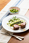 Low-cooked pork fillet with broad bean puree and braised green onion