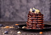 Vegan avocado pancakes with cocoa and date syrup