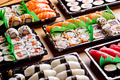 Sushi tableau with nigiri, maki and inside-out rolls