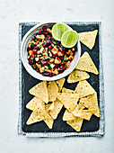 Hot vegetable salsa with tortilla chips