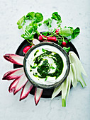Salsa verde yoghurt dip with raw vegetables