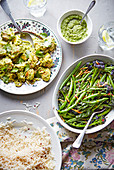 Coriander chicken with rice and spiced green vegetables