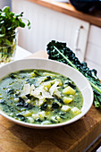 Kale and potatoe soup with parmigiano flakes