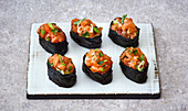 Gunkan sushi with salmon tartare