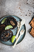 Grilled Portobello mushrooms with lime wedges