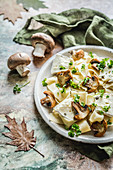 Autumn pasta with mushrooms, pepper-camembert and parsley