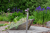 Wooden planter in the shape of a sinking ship