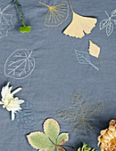 Embroidered cloth with autumn leaves