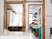 Half-timbering with a mirror and an open door leading to a children's room