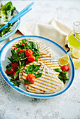 Grilled swordfish with braised cherry tomatoes and fresh herbs