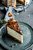 A piece of Christmas chocolate cheesecake decorated with anise stars