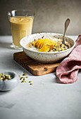 Porridge with oranges and pumpkin seeds