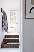 Vintage steps, with cloakroom strips above in the entrance area