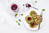 Spinach pancakes with lingonberry jam