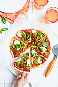 Rainbow pizza with vegetables and mozzarella