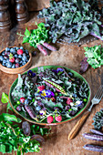 Berry purple kale salad