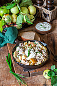 Apple pork stew with potatoes and sour cream