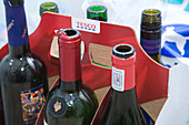 Carton of wine bottles for recycling