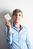 Woman with a hormone replacement therapy patch