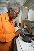 Elderly woman in kitchen