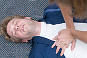First Aid Officer carrying out CPR on an injured colleague