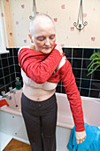 Woman who has had a mastectomy and chemotherapy dressing
