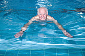 Older man swimming