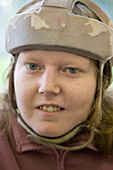 Young woman with learning disability wearing a helmet