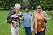 Group of older woman walking in the park