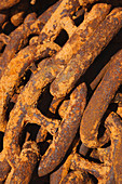 Rusty chain on quayside
