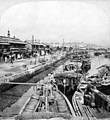 Native boats on a waterway in Yokohama, Japan, 1901