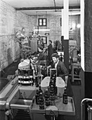 The final stages of bottling whisky at Wiley & Co, 1960