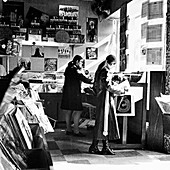 Two women in a London record store, c1960s