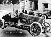 WO Bentley at the wheel of his DFP car, 1914