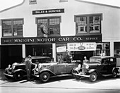 1932 Ford V8 in front of a car showroom